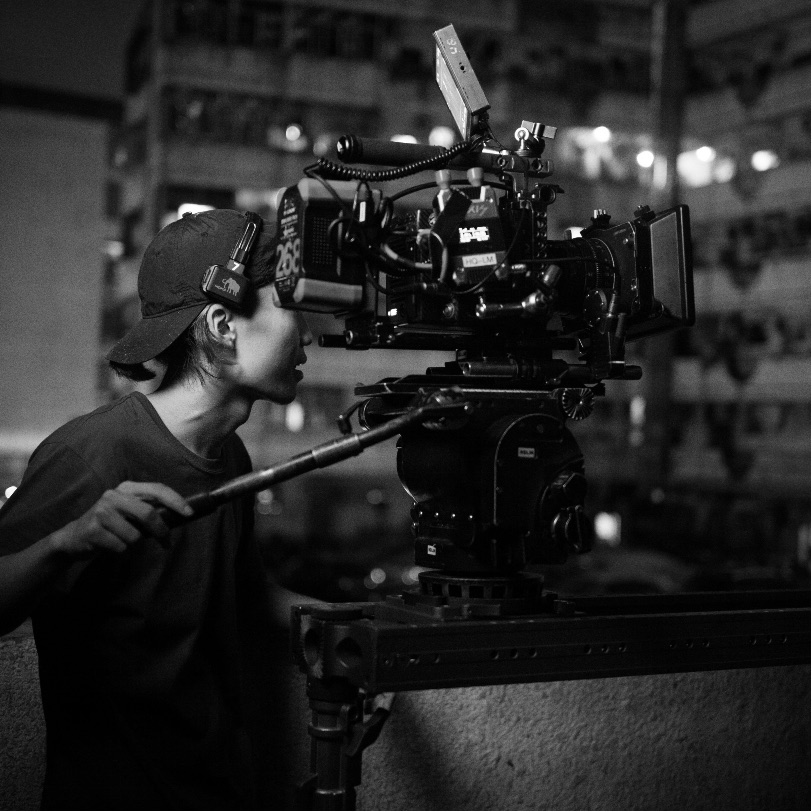 Huang Junyao working with a cinema camera